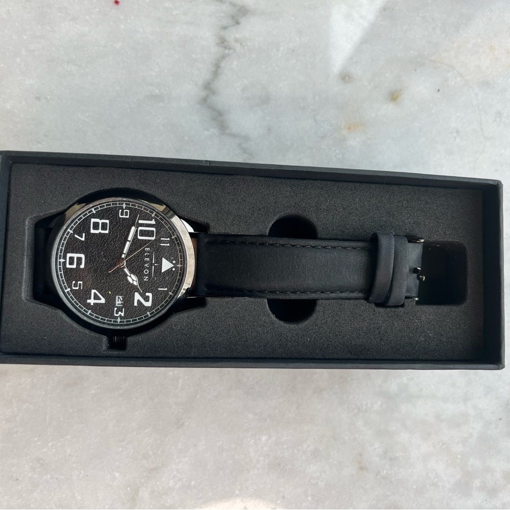 Black Minimalist Watch with Leather Strap and Stainless Steel Case